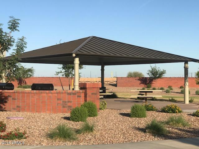 4156 East Cynthia Street Gilbert, AZ 85295 - Photo 21 of 25 a view of a swimming pool with a patio