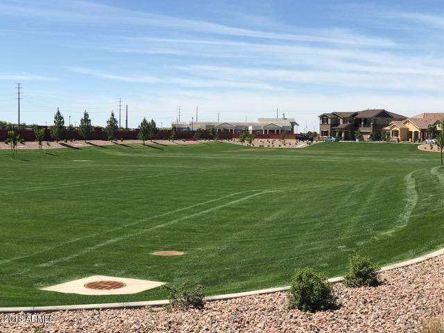 4156 East Cynthia Street Gilbert, AZ 85295 - Photo 4 of 25 a view of a golf course with a field