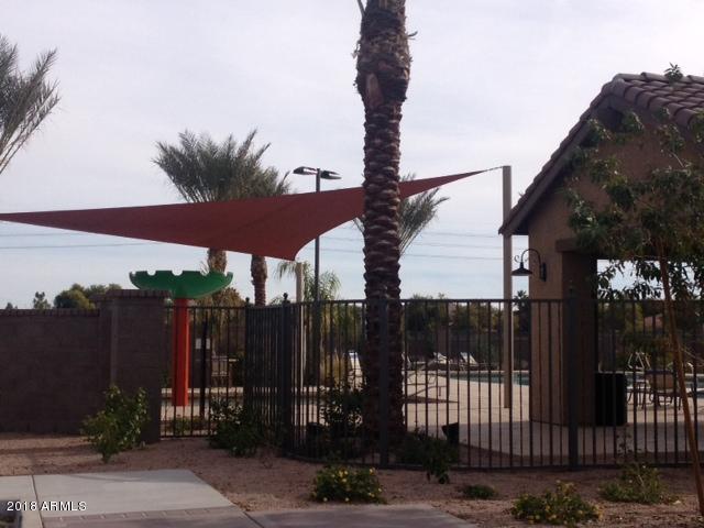 4156 East Cynthia Street Gilbert, AZ 85295 - Photo 7 of 25 a front view of a house with garden