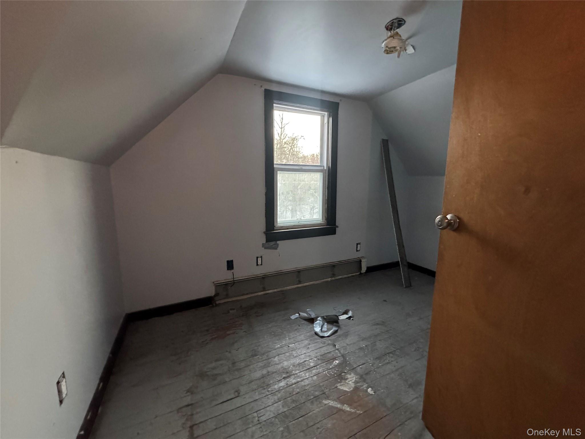 74 Cold Spring Road Liberty, NY 12754 - Photo 12 of 16 an empty room with a window