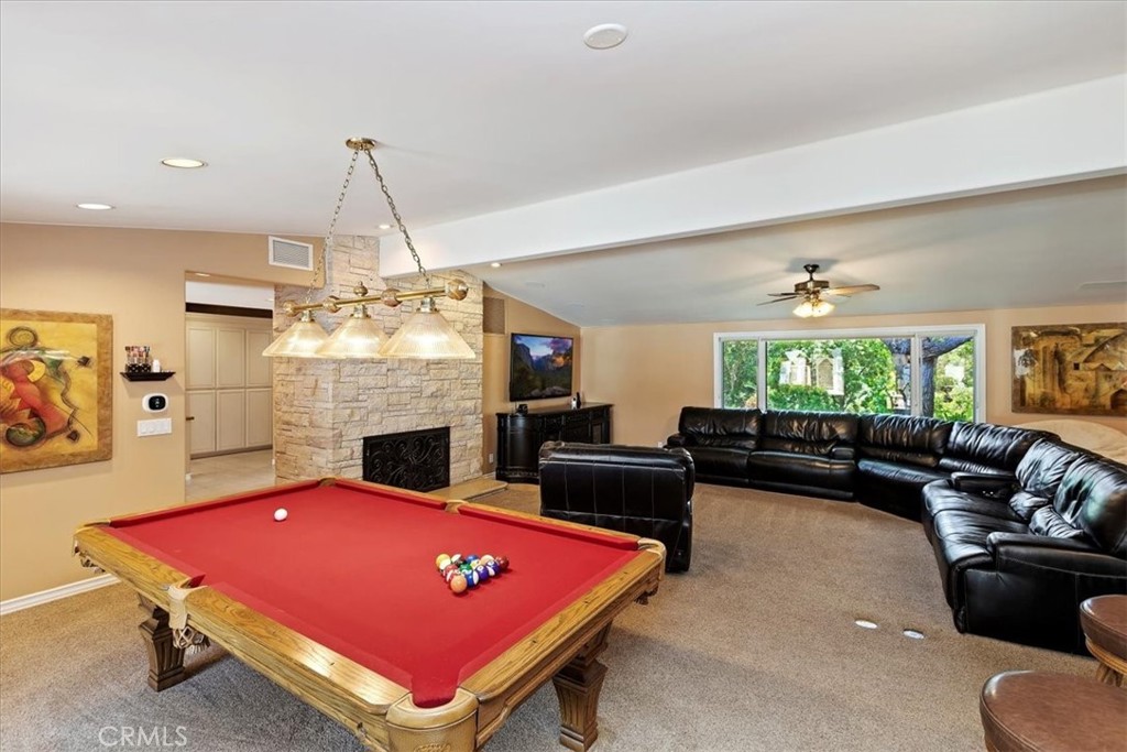 2100 Hathaway Place Riverside, CA 92506 - Photo 18 of 74 a living room with furniture pool table and a chandelier