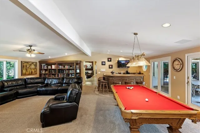 a view of living room with furniture and a window