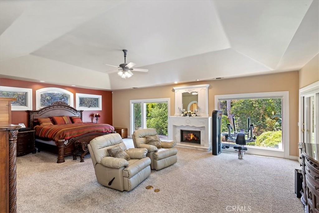 2100 Hathaway Place Riverside, CA 92506 - Photo 32 of 74 a living room with furniture large window and a fireplace