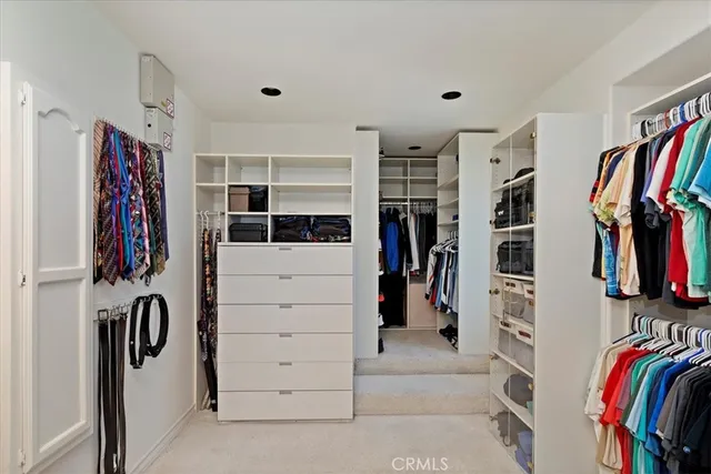 swimming pool view with a seating space and a garden view