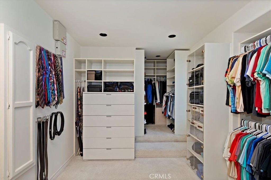2100 Hathaway Place Riverside, CA 92506 - Photo 39 of 74 a view of walk in closet with clothes and shoes