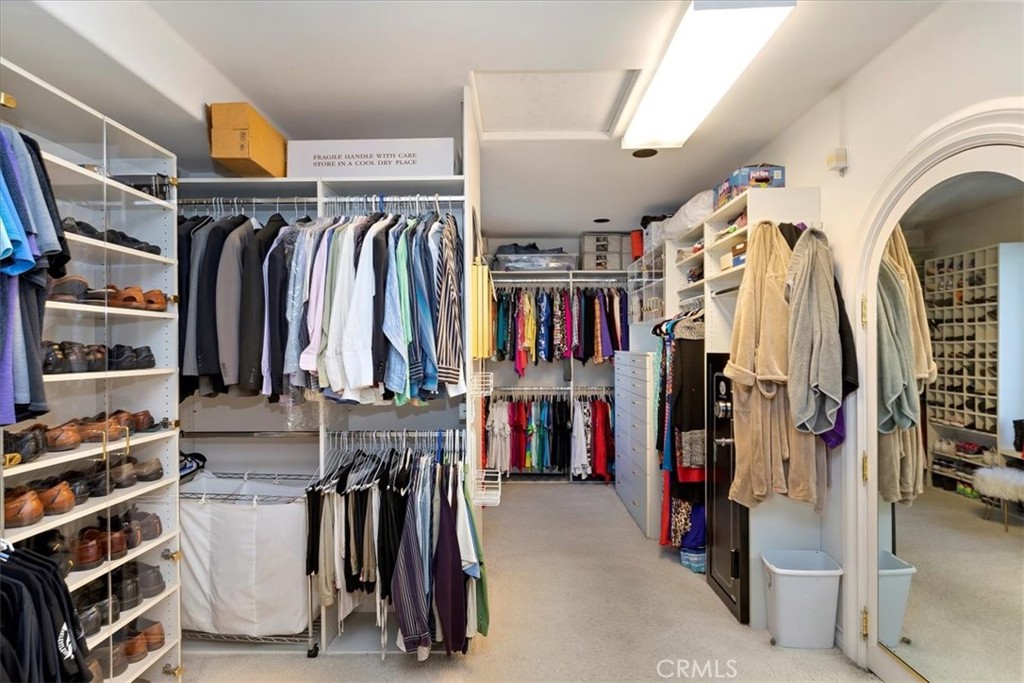 2100 Hathaway Place Riverside, CA 92506 - Photo 40 of 74 a view of walk in closet with clothes and shoes