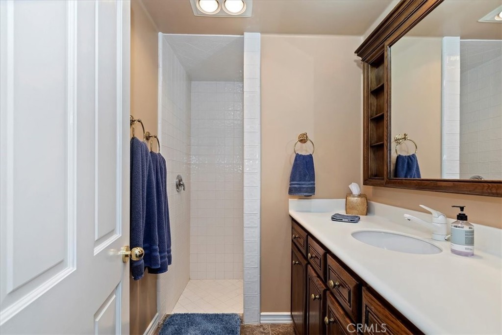 2100 Hathaway Place Riverside, CA 92506 - Photo 45 of 74 a bathroom with a sink and a mirror