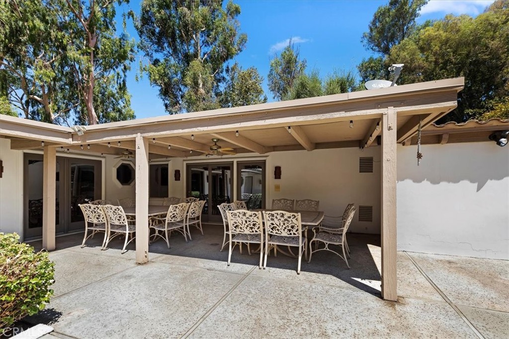 2100 Hathaway Place Riverside, CA 92506 - Photo 61 of 74 a patio with table and chairs