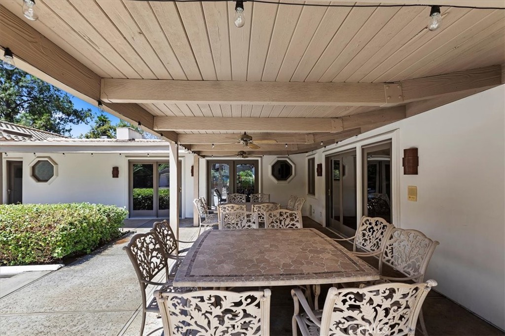 2100 Hathaway Place Riverside, CA 92506 - Photo 62 of 74 a view of a patio with table and chairs