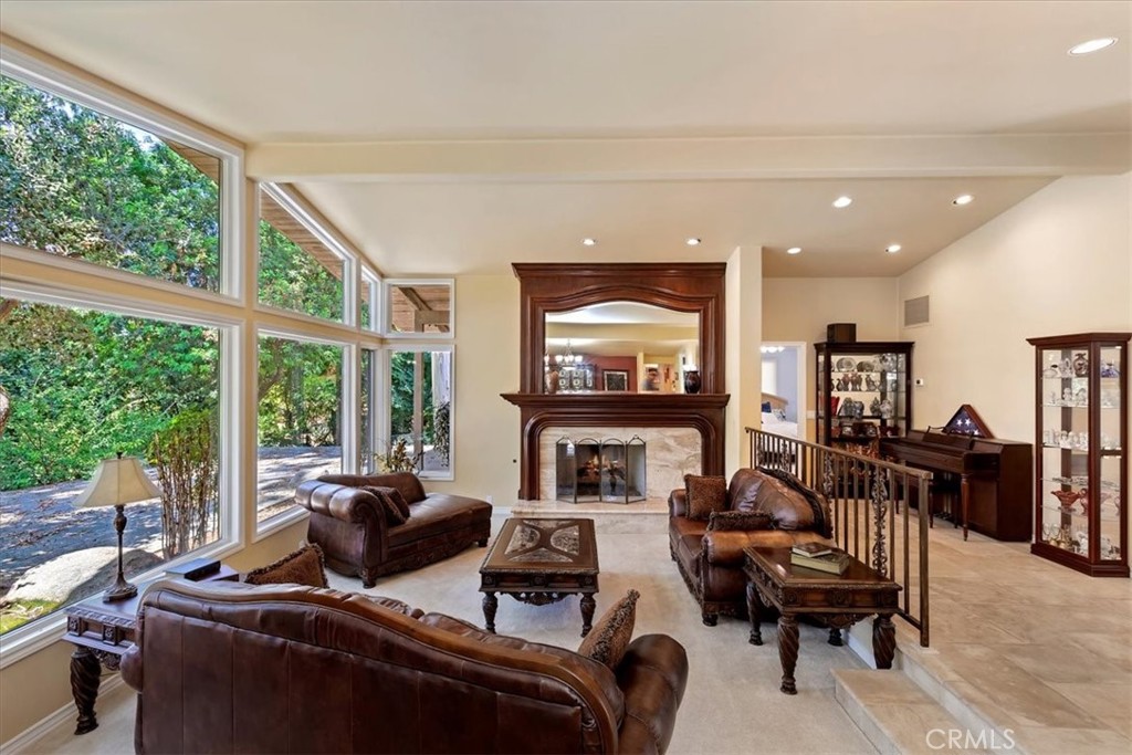2100 Hathaway Place Riverside, CA 92506 - Photo 9 of 74 a living room with furniture and a flat screen tv