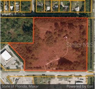 3214 Ave D Fort Pierce, FL 34947 - Photo 3 of 4 front view of a house with a yard