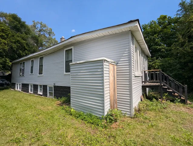 a house view with a backyard space
