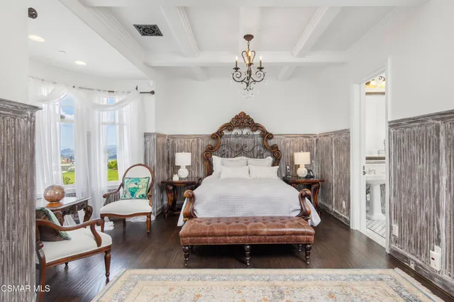 a front view of a house with a garden and porch