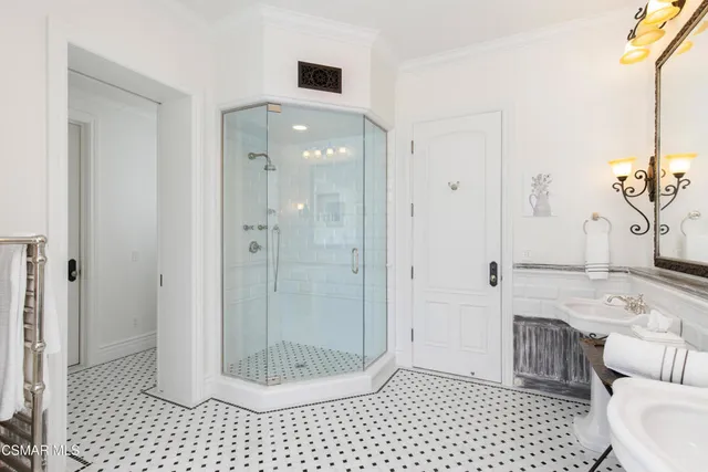 a kitchen with stainless steel appliances granite countertop a stove and cabinets