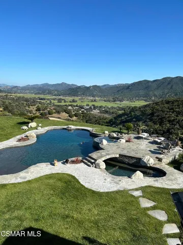 an aerial view of a swimming pool