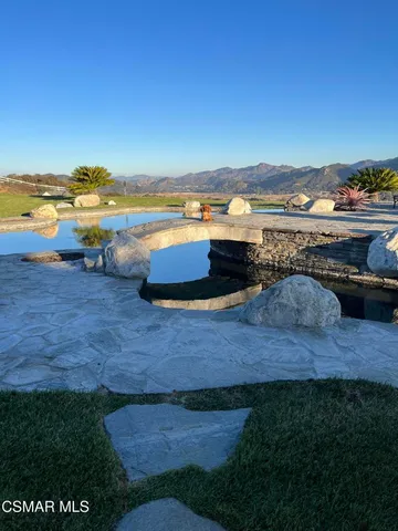 a view of a lake with a mountain in the background
