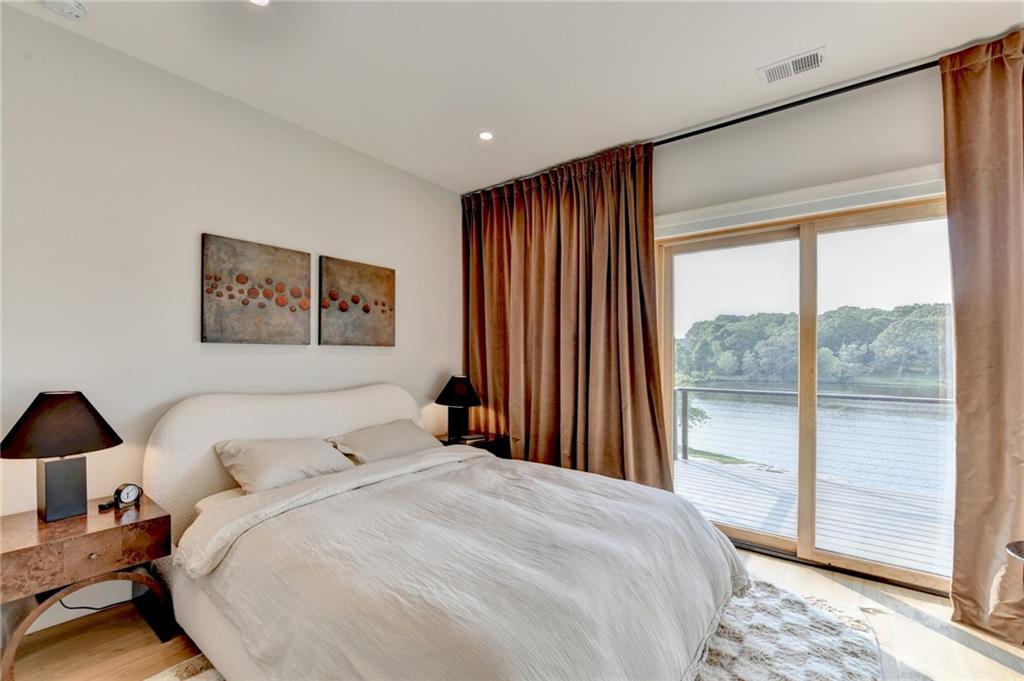 120 Mt Moriah Road Auburn, GA 30011 - Photo 30 of 48 a bedroom with a large bed and a large window