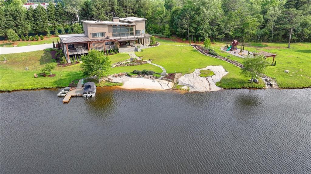120 Mt Moriah Road Auburn, GA 30011 - Photo 36 of 48 an aerial view of a house with a garden and swimming pool