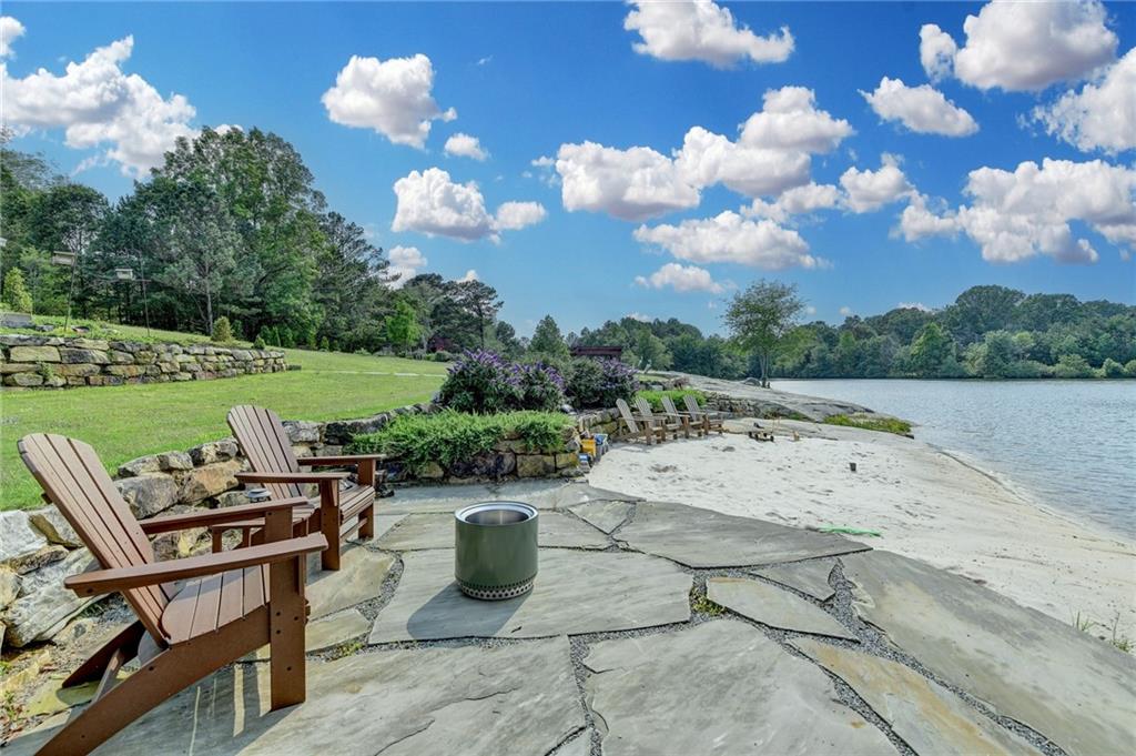120 Mt Moriah Road Auburn, GA 30011 - Photo 37 of 48 a view of a swimming pool with a patio and a garden