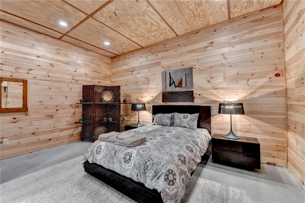 120 Mt Moriah Road Auburn, GA 30011 - Photo 43 of 48 a bedroom with a bed and wooden floor