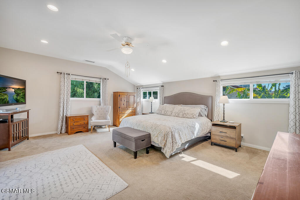 11780 Barranca Road Camarillo, CA 93012 - Photo 15 of 26 a spacious bedroom with a bed and a couch