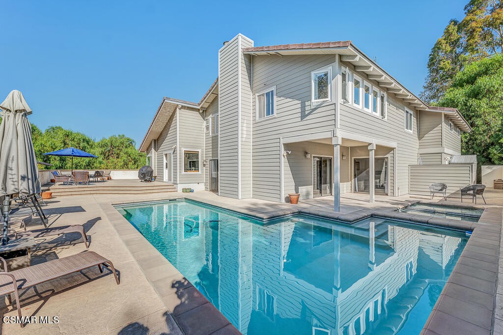11780 Barranca Road Camarillo, CA 93012 - Photo 18 of 26 a view of a house with a swimming pool