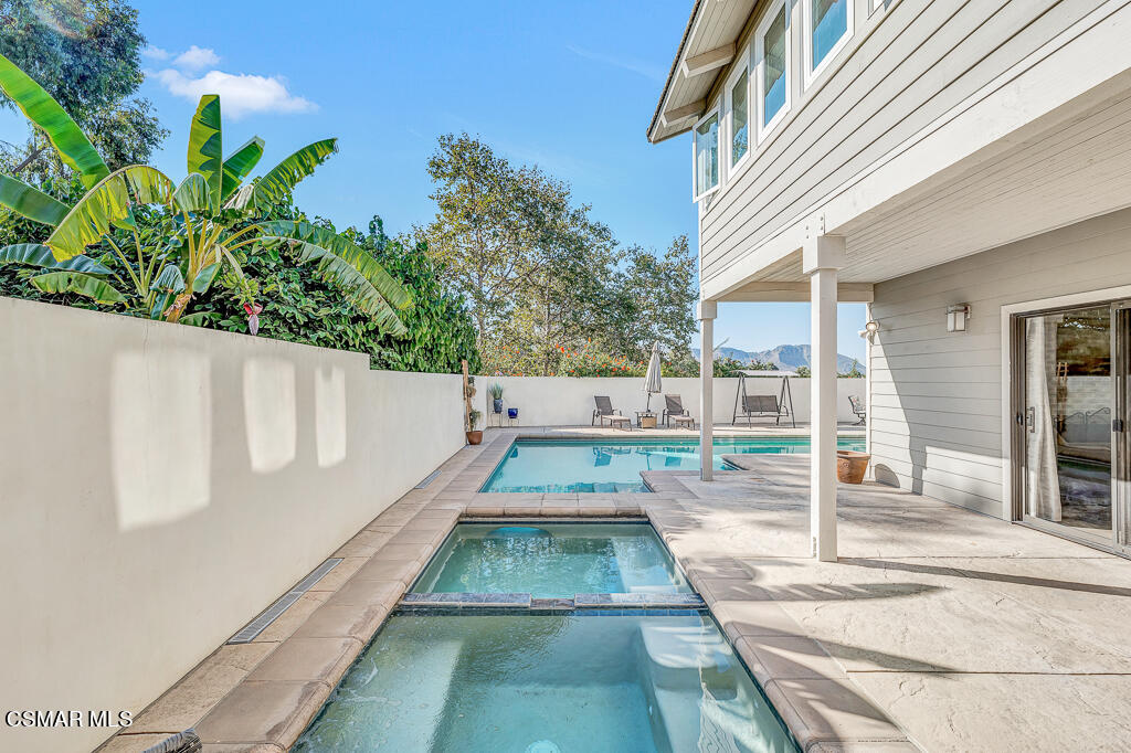 11780 Barranca Road Camarillo, CA 93012 - Photo 19 of 26 a view of a swimming pool with a patio