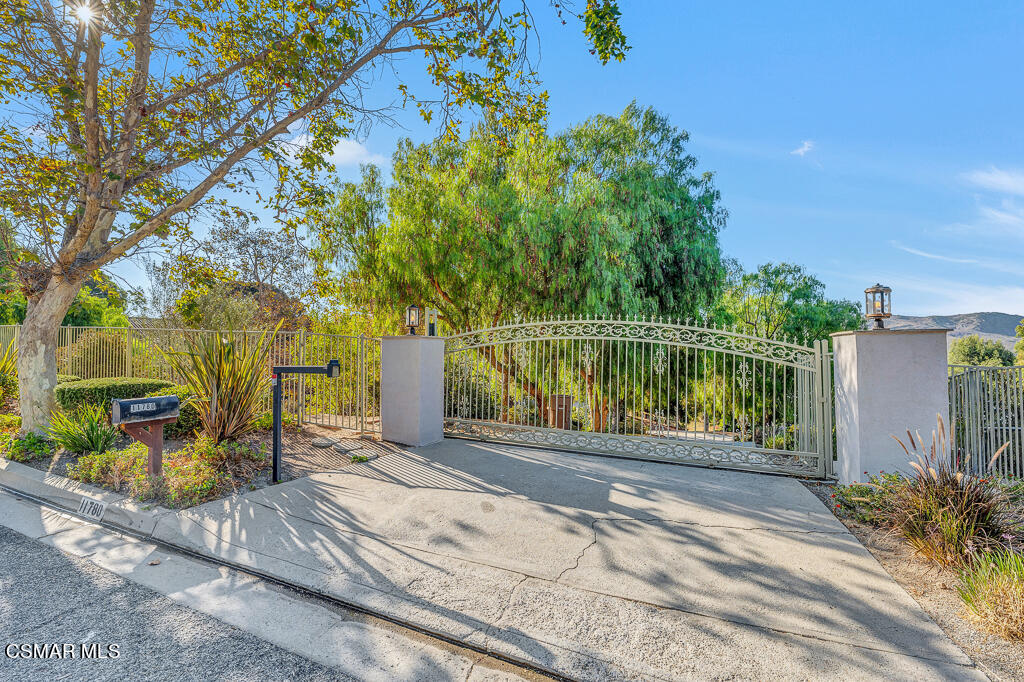 11780 Barranca Road Camarillo, CA 93012 - Photo 2 of 26 a front view of a house with a yard