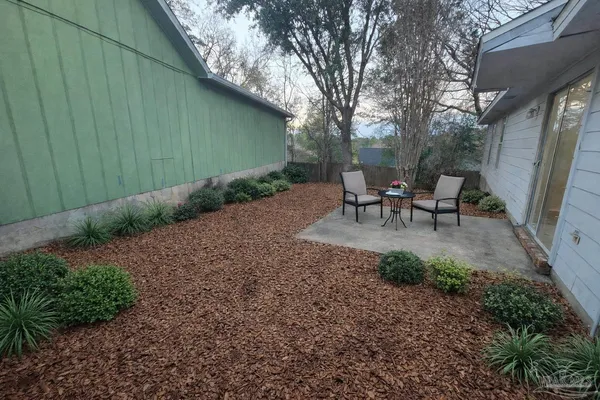 a front view of a house with ocean view