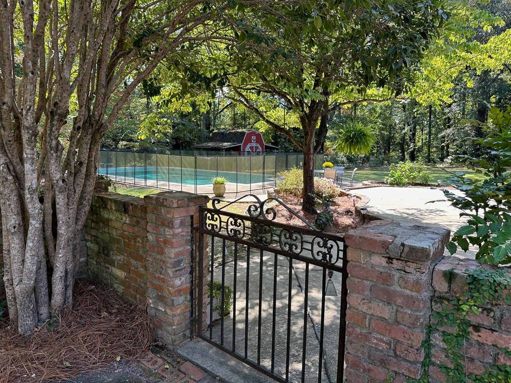 13952 Cross Creek Road Upatoi, GA 31829 - Photo 50 of 79 Gate from parking to Back yard
