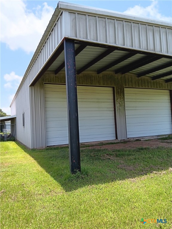 490 Adcock Ranch Road Victoria, TX 77904 - Photo 5 of 10 a black car parked in front of house
