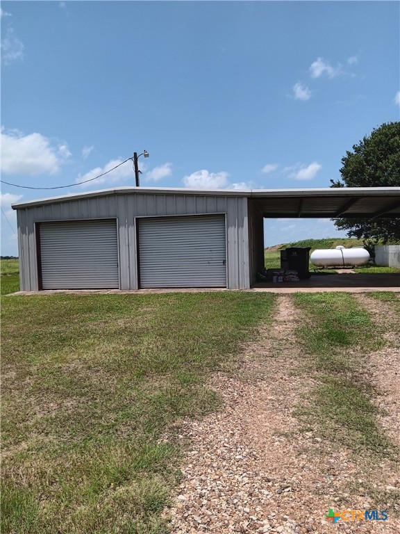 490 Adcock Ranch Road Victoria, TX 77904 - Photo 8 of 10 a front view of a house with yard