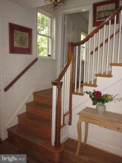 7403 Denton Road Bethesda, MD 20814 - Photo 2 of 25 a view of entryway and hall with wooden floor