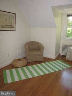 7403 Denton Road Bethesda, MD 20814 - Photo 21 of 25 a view of room with window and stairs