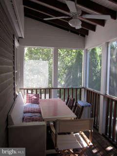 7403 Denton Road Bethesda, MD 20814 - Photo 8 of 25 a view of a balcony with furniture