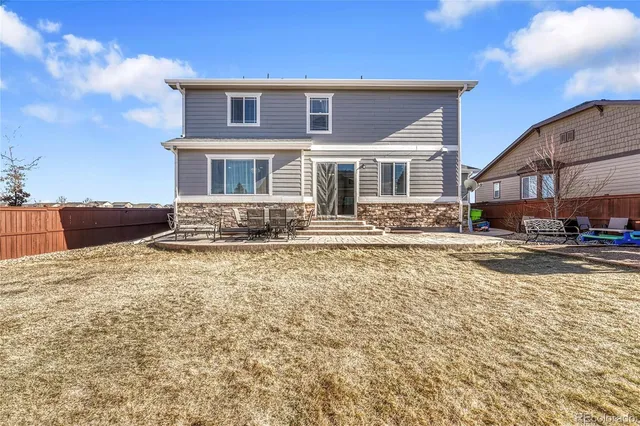 a front view of a house with yard