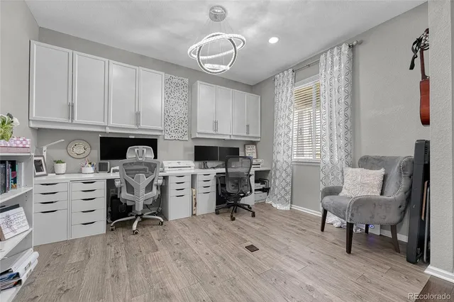 a view of kitchen with workspace and a window