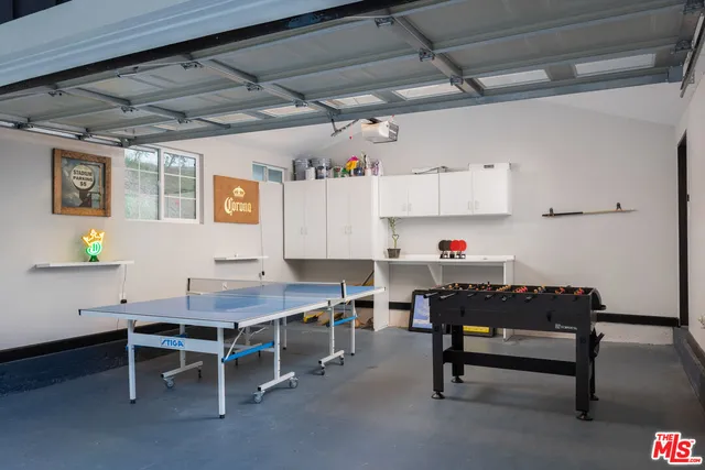 a room with furniture and a window