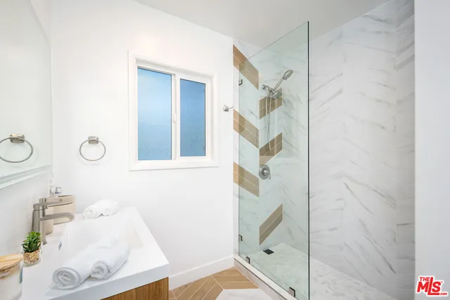 a view of yard with swimming pool and green space