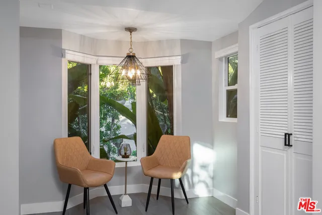 a view of a livingroom with furniture window and outside view