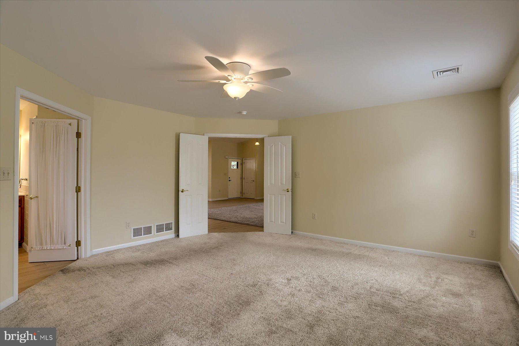802 Heather Ridge Manheim, PA 17545 - Photo 15 of 41 a view of an empty room with a fan