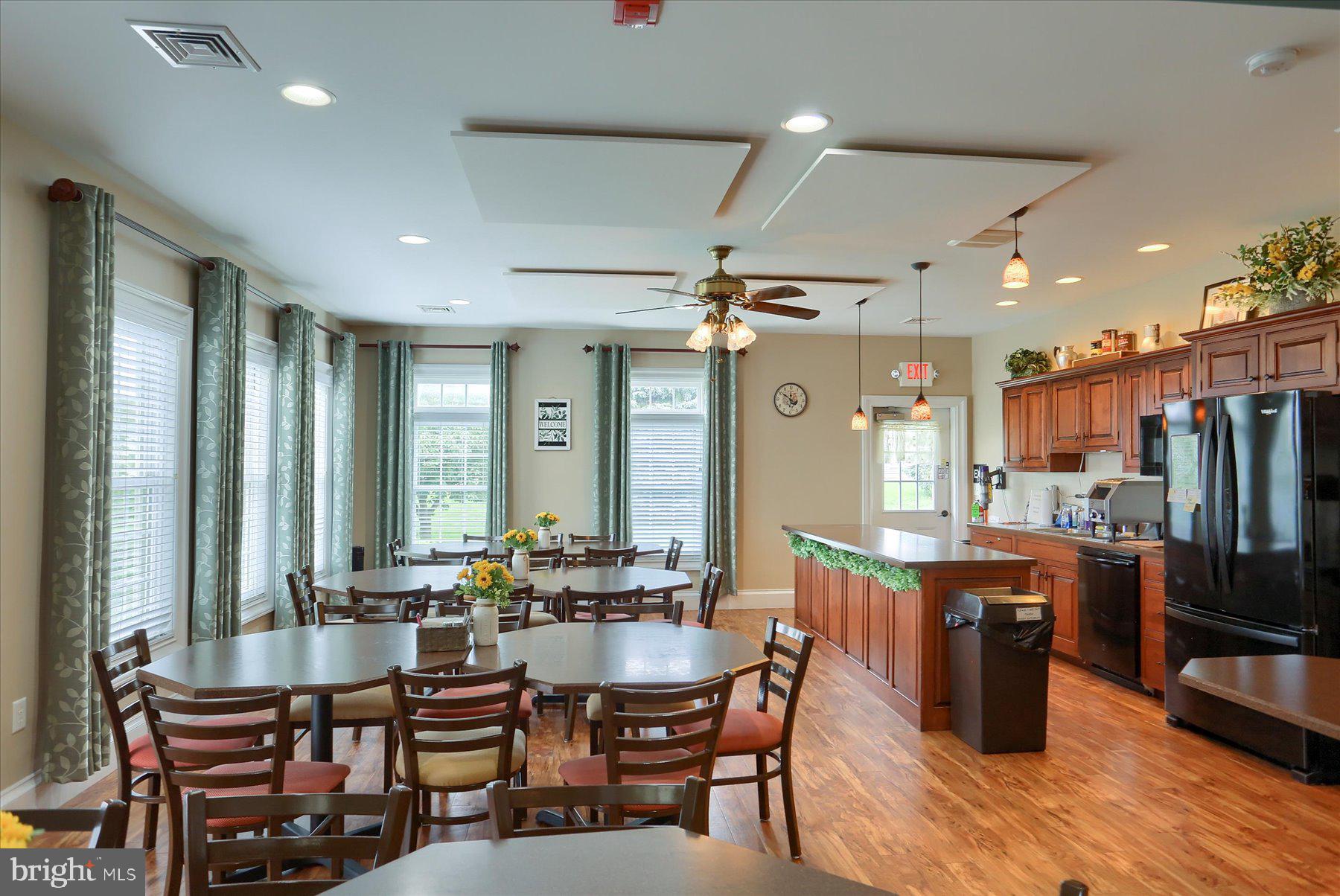 802 Heather Ridge Manheim, PA 17545 - Photo 36 of 41 a view of a dining area with furniture window and wooden floor