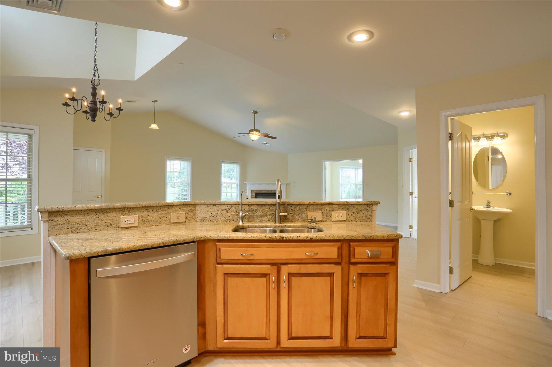 802 Heather Ridge Manheim, PA 17545 - Photo 7 of 41 a bathroom with a granite countertop sink a large mirror and a shower