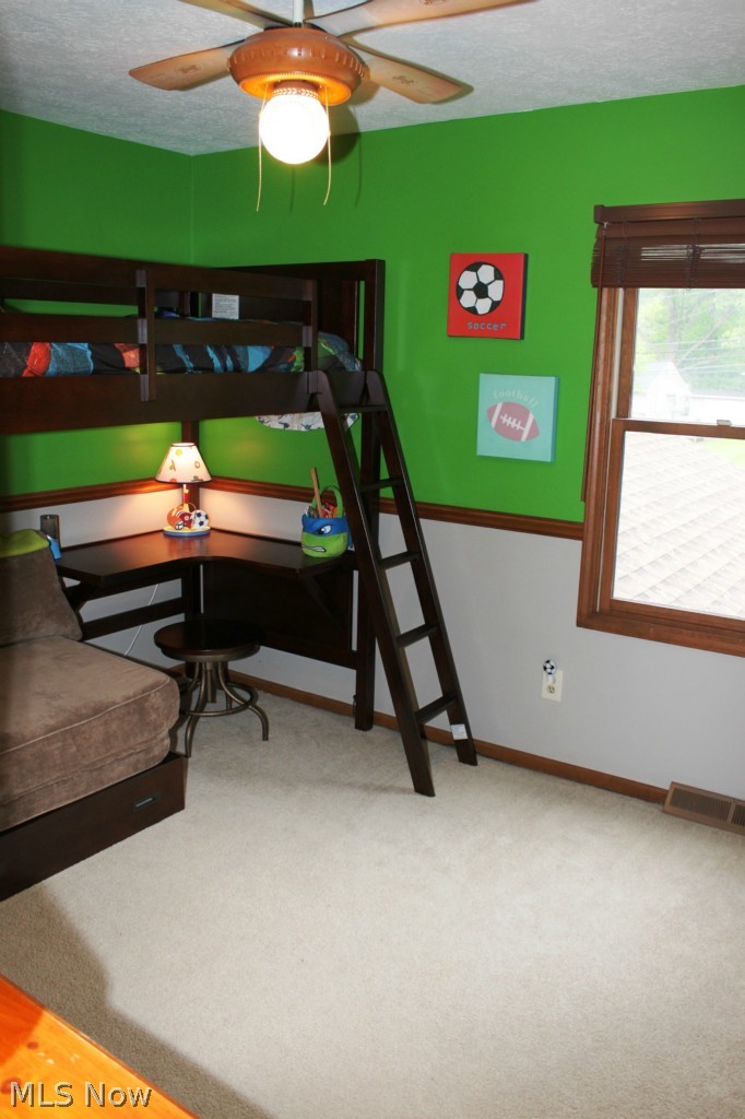 3232 Walter Road Westlake, OH 44145 - Photo 8 of 23 Bedroom two has a chair rail and is painted in some festive colors!