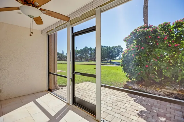 a view of a porch and a yard