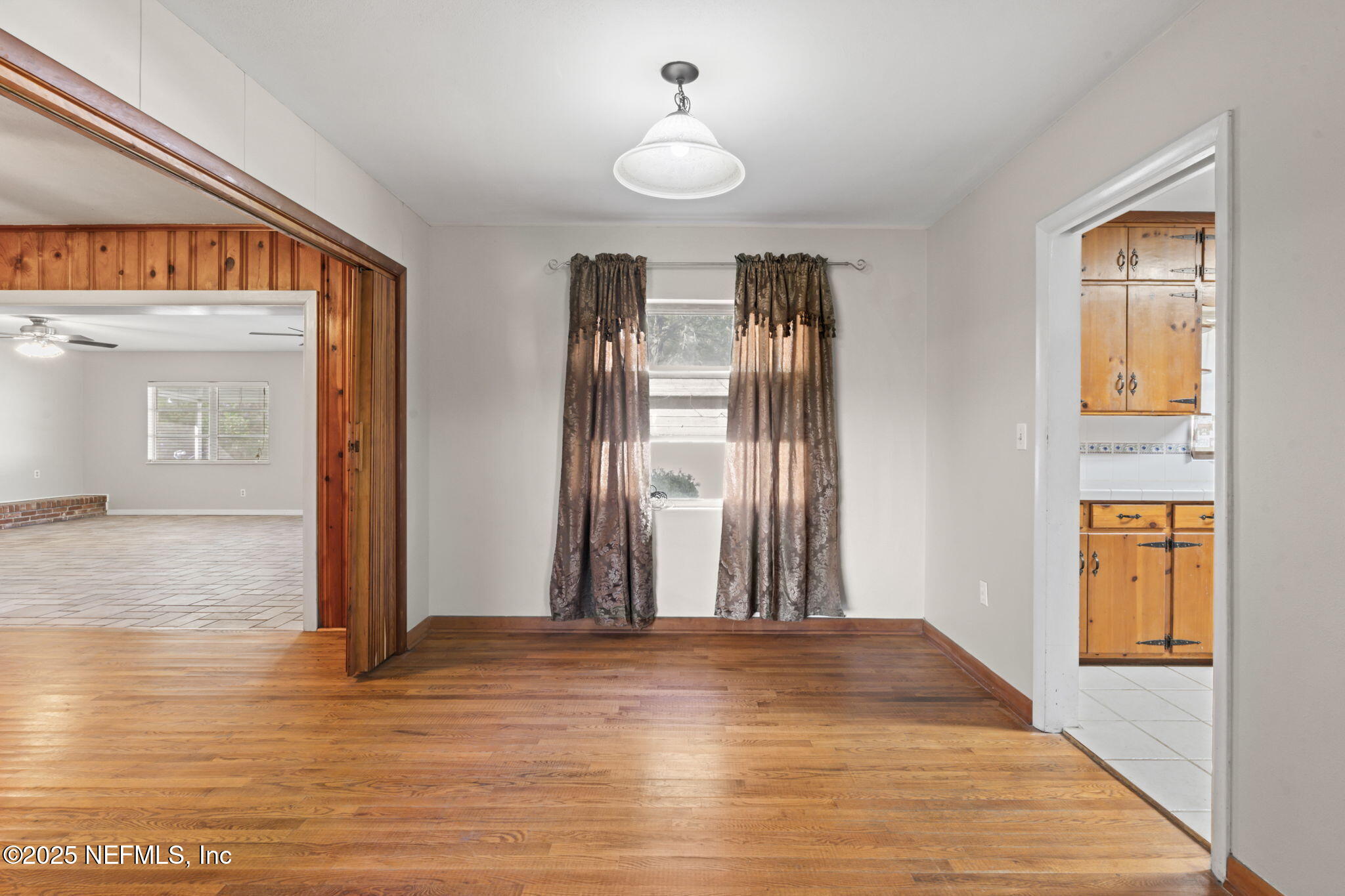 17896 Highway 16 Starke, FL 32091 - Photo 11 of 57 a view of a room with wooden floor and windows