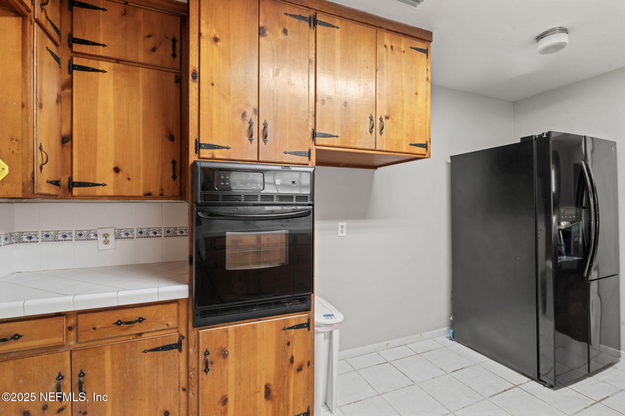 17896 Highway 16 Starke, FL 32091 - Photo 15 of 57 a kitchen with stainless steel appliances granite countertop a refrigerator and a stove