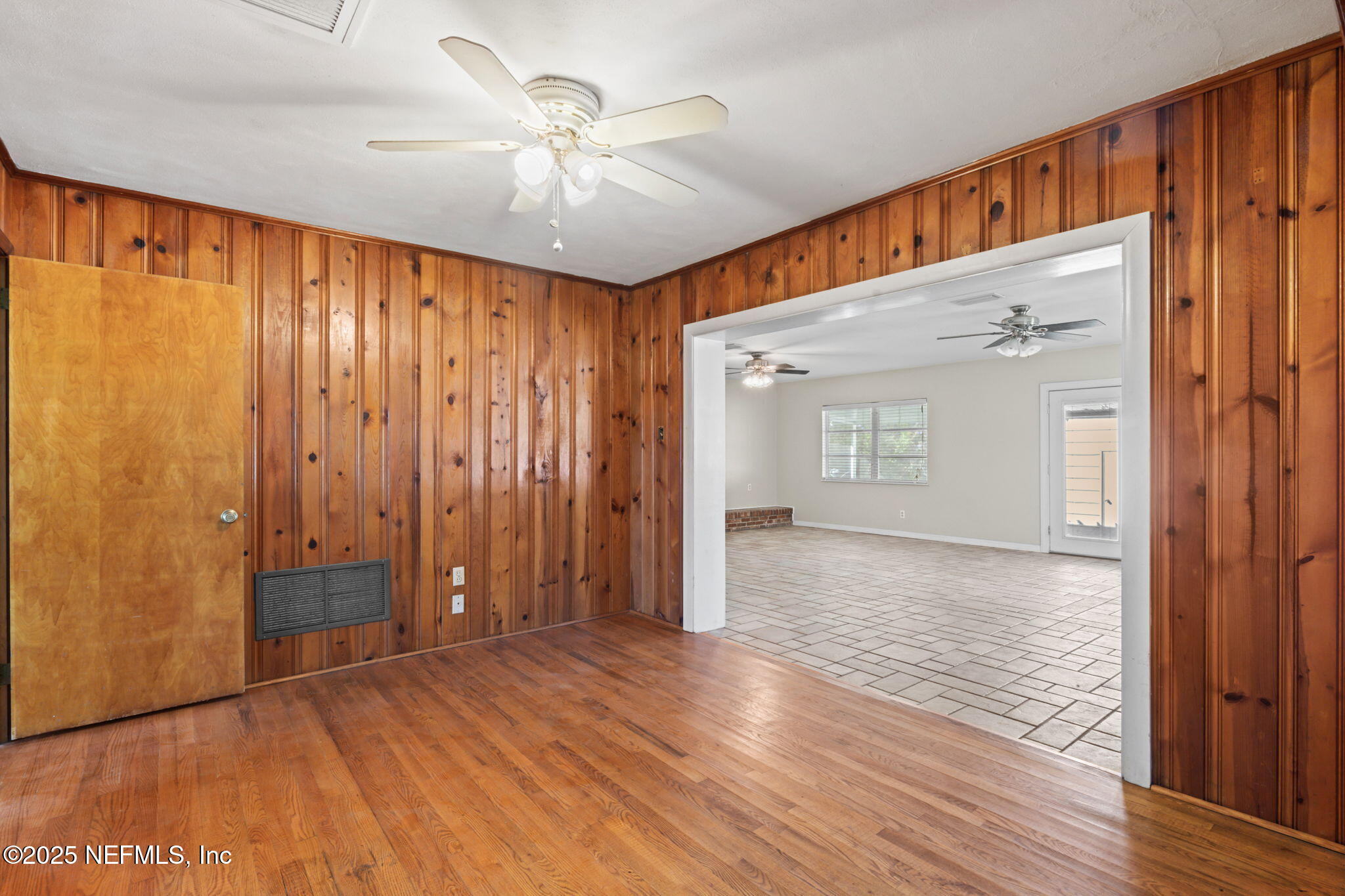 17896 Highway 16 Starke, FL 32091 - Photo 16 of 57 wooden floor in an empty room with a window