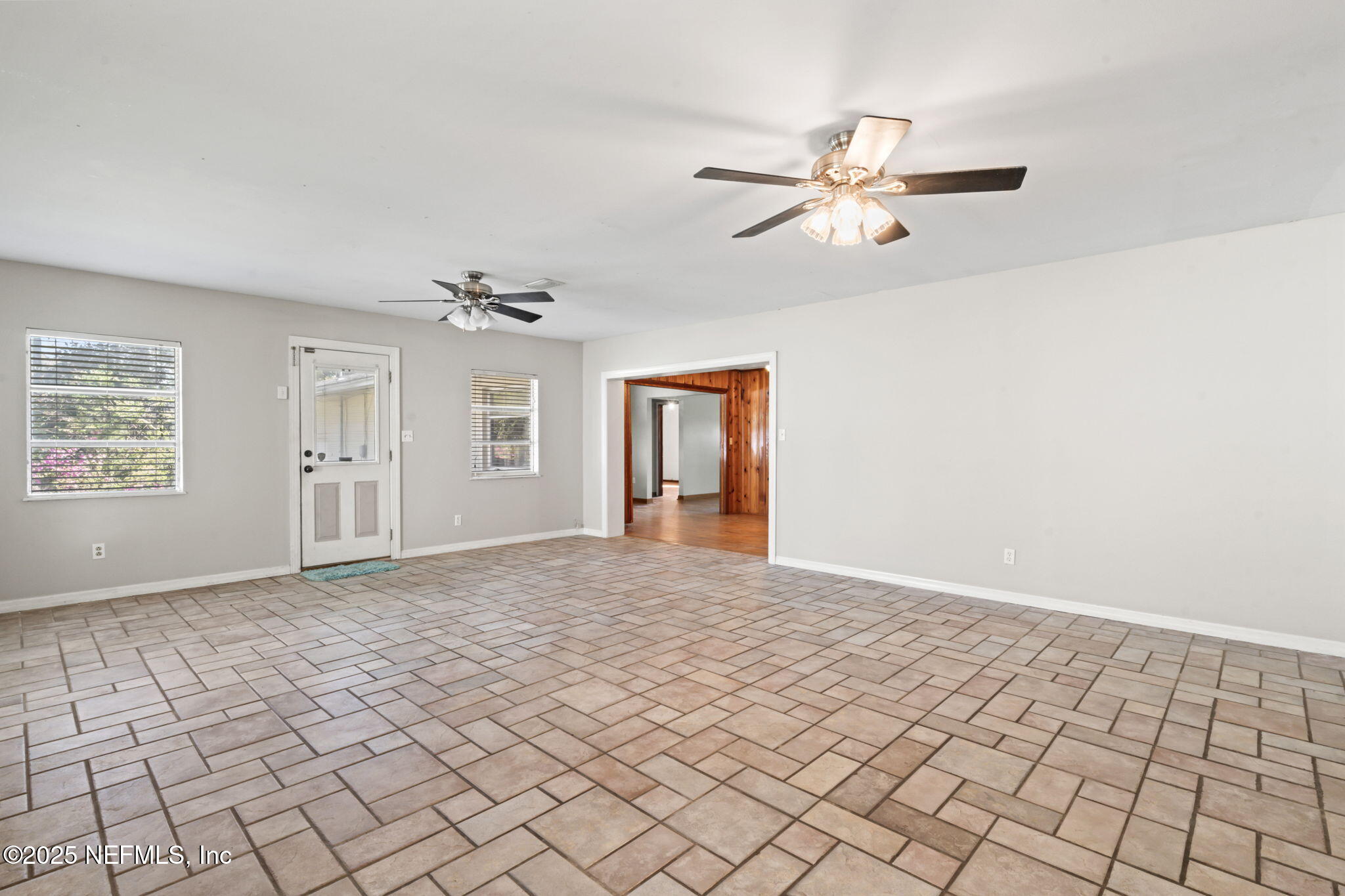 17896 Highway 16 Starke, FL 32091 - Photo 23 of 57 a view of an empty room with window and cabinet