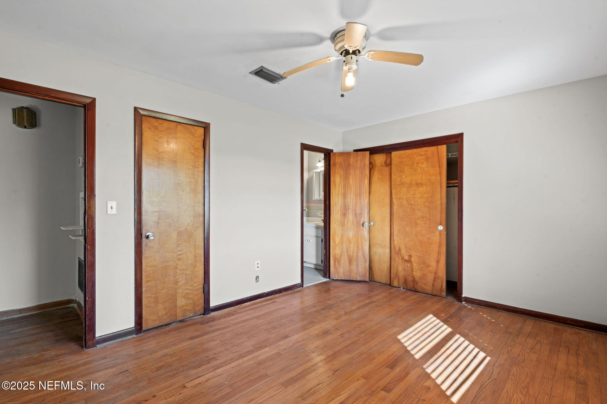 17896 Highway 16 Starke, FL 32091 - Photo 27 of 57 wooden floor in an empty room with a window